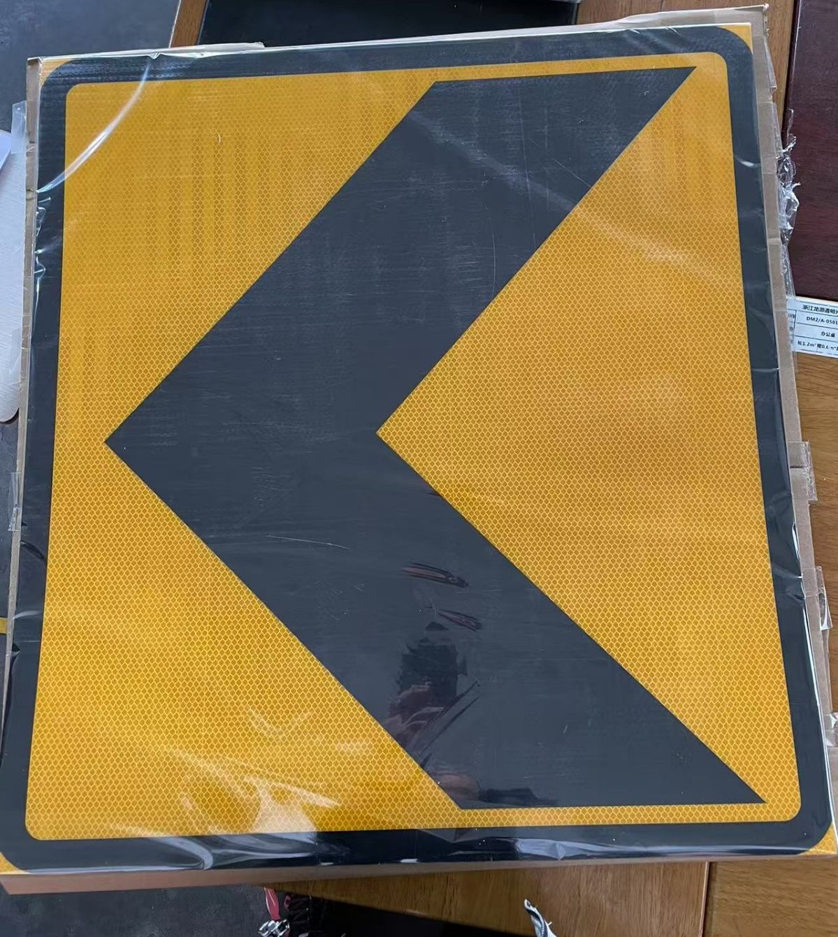 Prismatic reflective sheeting signs